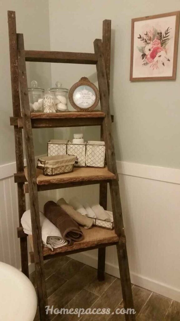 29 Bathroom Decor Ideas That Transform Any Space 14 Add a Slim Ladder Shelf or Towel Ladder