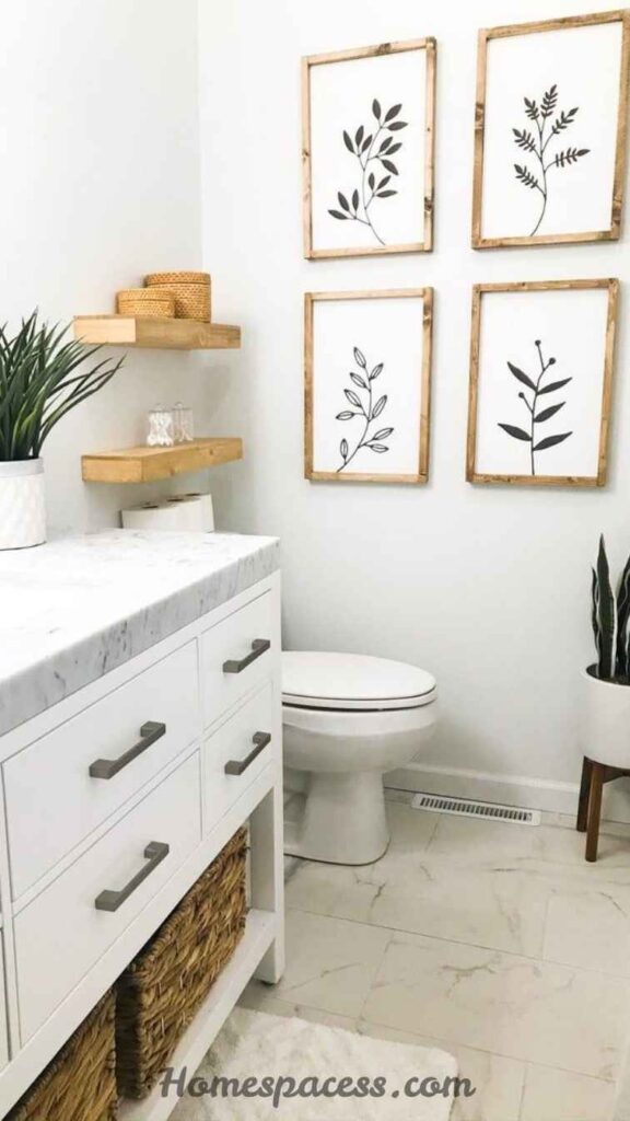 29 Bathroom Decor Ideas That Transform Any Space 24 Hang Art in the Bathroom