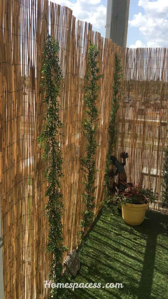 DIY Balcony Privacy Ideas to Upgrade Your Outdoor Space 7 Bamboo or Reed Fencing for a Natural Barrier