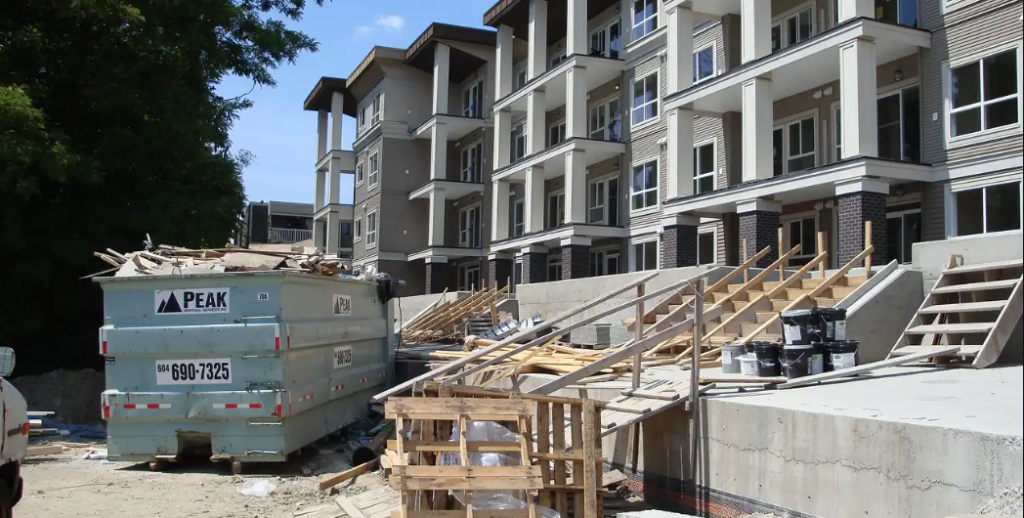 Dumpster Rental Considerations for Multi-Building Roofing Work Multi-Building