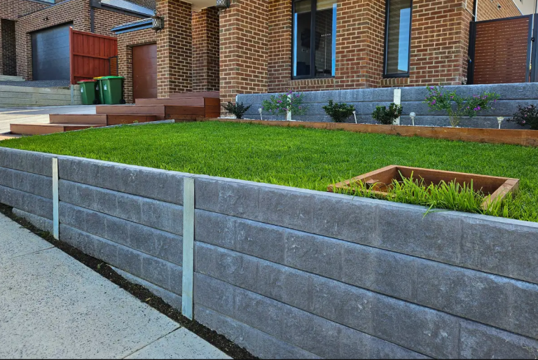 Building a Garden Retaining Wall That Lasts: A Homeowner’s Guide Garden wall before House Image